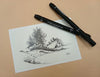 Two black markers on a piece of paper with a landscape drawing featuring trees and rock outcrops on a beige background