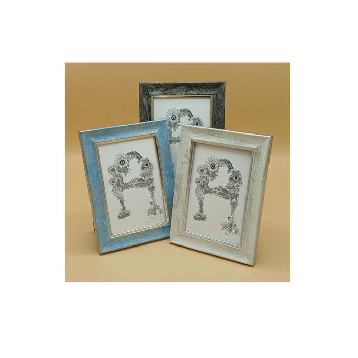 Three decorative picture frames with floral design of the letter "A" on a beige background