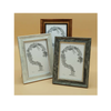 Three framed pictures showing artwork of a stylized tree with intricate details on a beige background