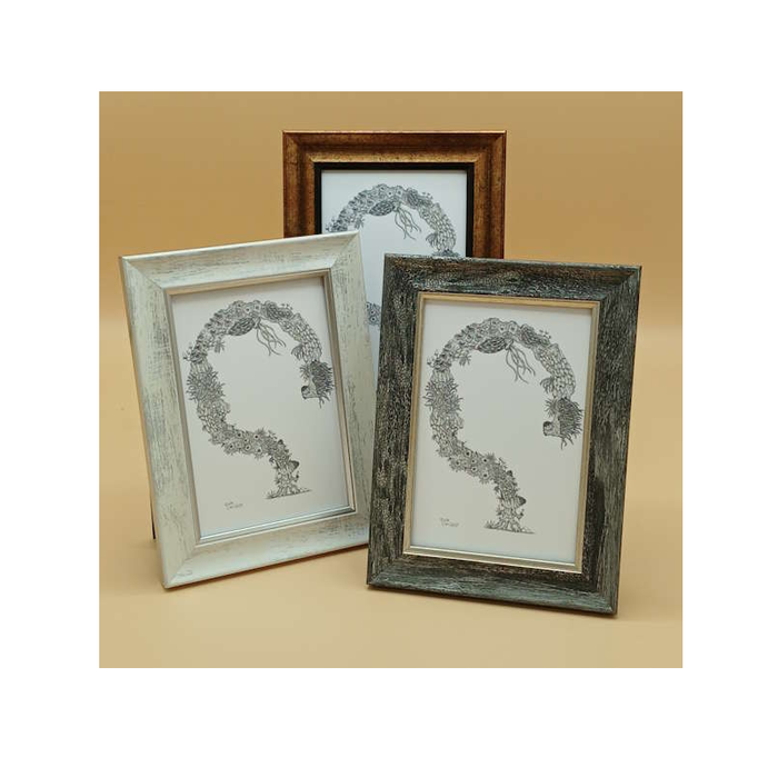 Three framed pictures showing artwork of a stylized tree with intricate details on a beige background